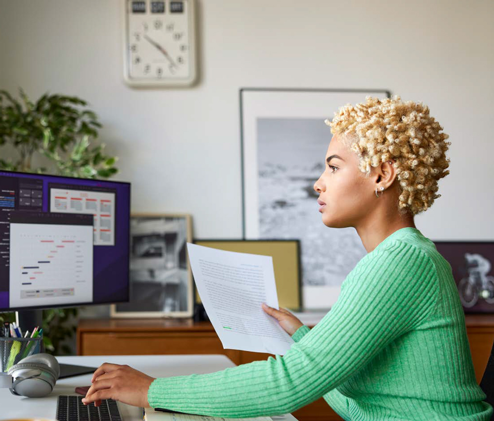 woman looking at computer