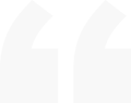 A simple, minimalistic white arrow pointing upward and branching into two directions at the top, resembling a Y shape. The background is also white, creating a subtle contrast.