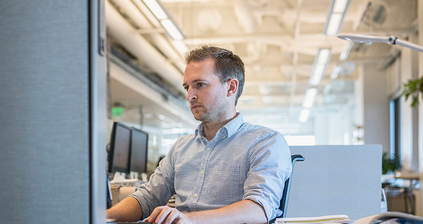A man working on a computer.