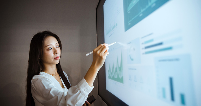 Woman analyzing data analytics