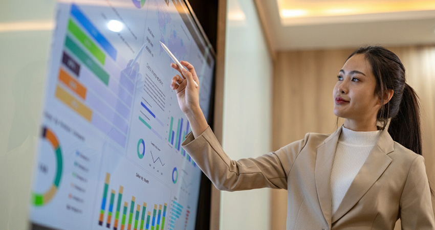 Woman pointing to analytics
